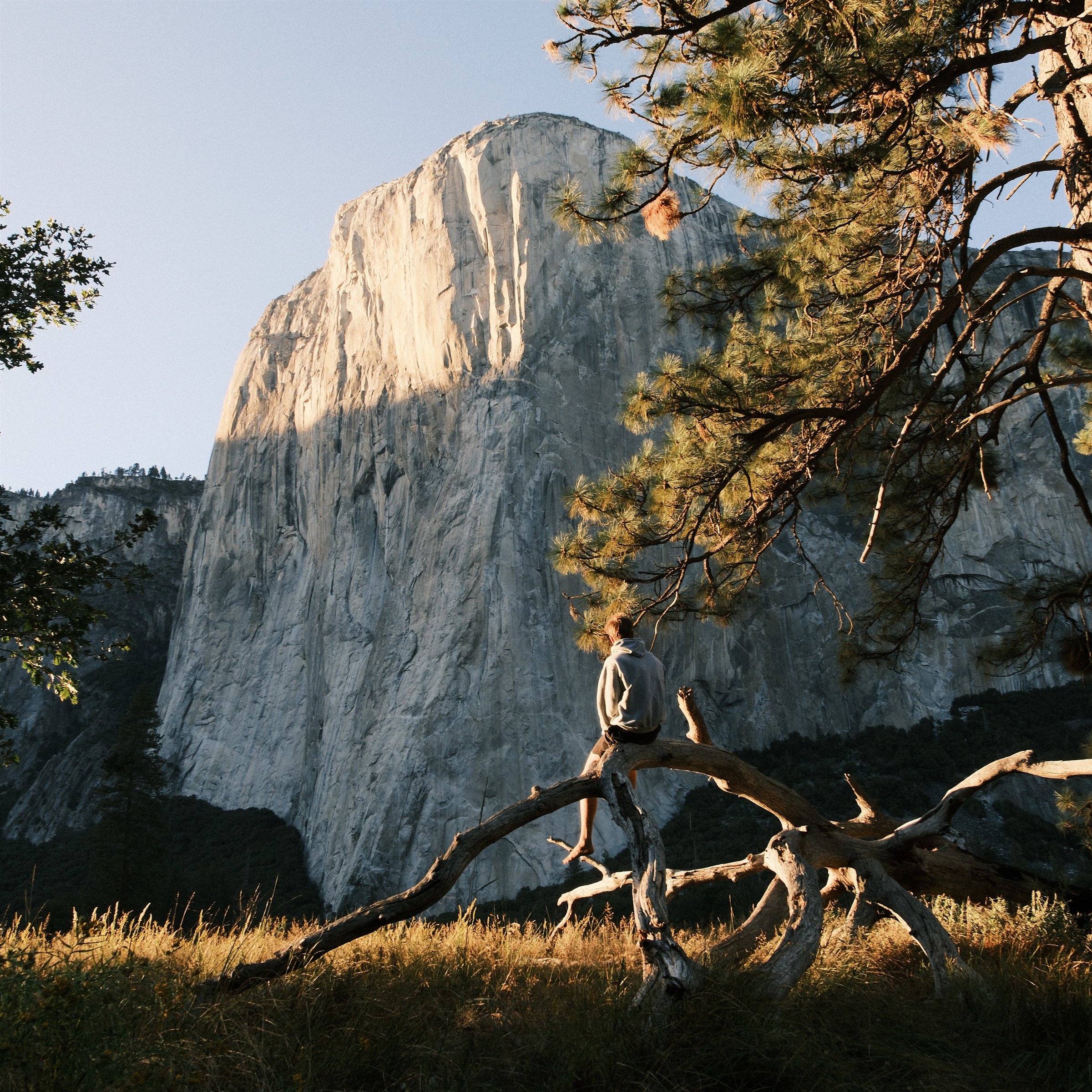 Landon sitting beneath El Capitan in Yosemite
